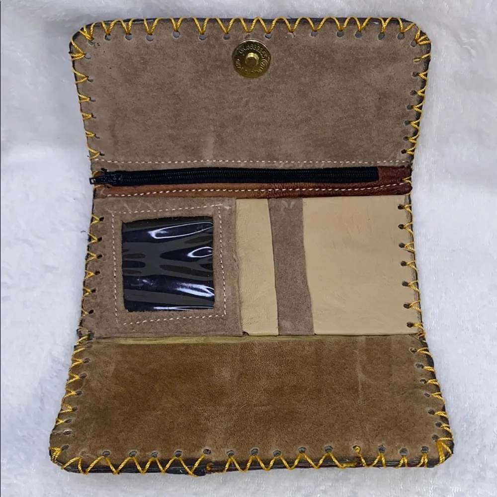 Brown and Yellow Wallet with Decorative Medallion